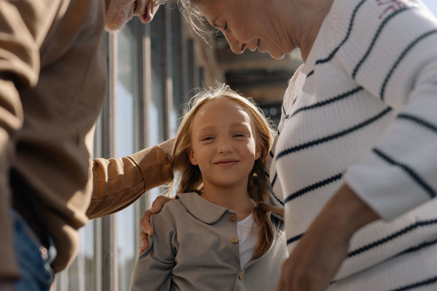 Grandparents with their granddaughter